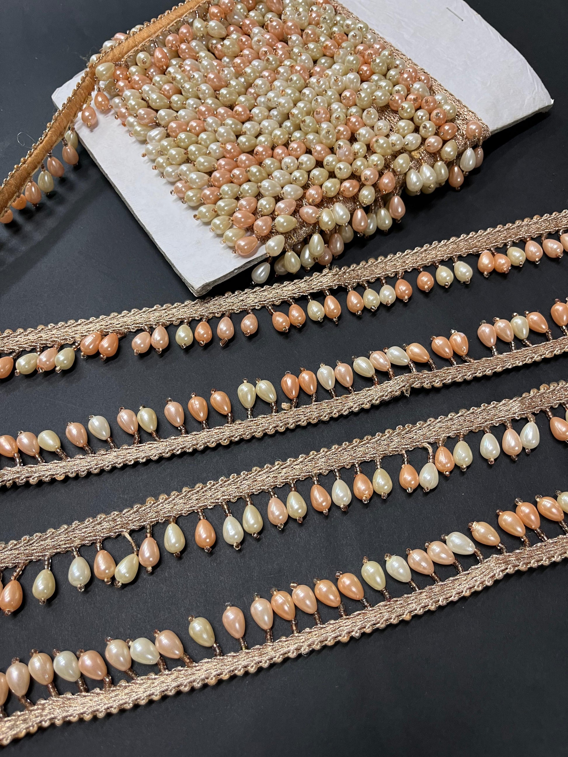 Elegant Bead and Pearl Hanging Lace Border Perfect Latkan Lace for Sarees, Lehengas, and Dresses 9 Meter | Cream & Rose Gold Elegant Bead and Pearl Hanging Lace Border Perfect Latkan Lace for Sarees, Lehengas, and Dresses 9 Meter | Cream & Rose Gold